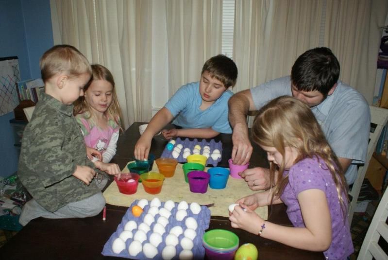Dyeing eggs with daddy. photo 47849_10200758181347297_1989128084_n.jpg